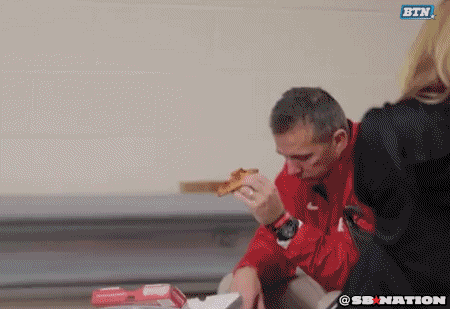 urban meyer sadly eating pizza