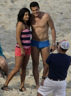 JC with girl on beach. 