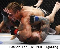 Urijah Faber defeats Eddie Wineland at UFC 128.