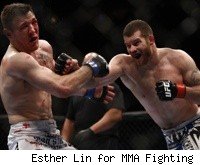 Nate Marquardt punches Dan Miller at UFC 128.