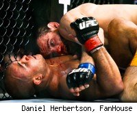 Jon Fitch on top of BJ Penn at UFC 127.