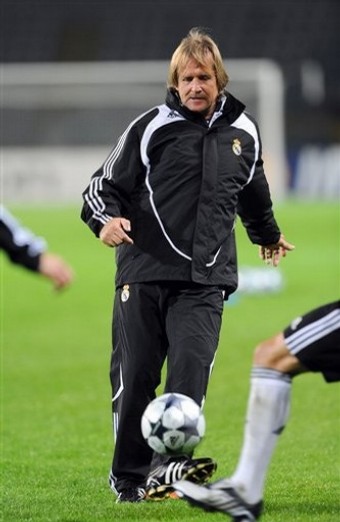 Real Madrid coach Bernd Schuster controls the ball during a training session ahead of Tuesday\'s Champions League soccer match against Juventus, at the Turin Olympic stadium, Italy, Monday, Oct. 20, 2008. (AP Photo/Massimo Pinca)